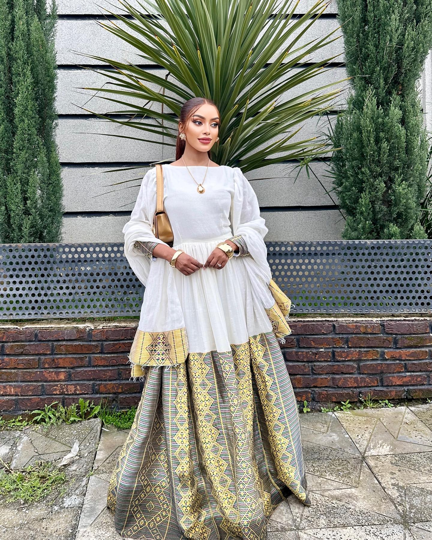  Habesha women for weddings, church, Eid, Meskel, Timket, and other cultural holidays, the Zuria Kemis 